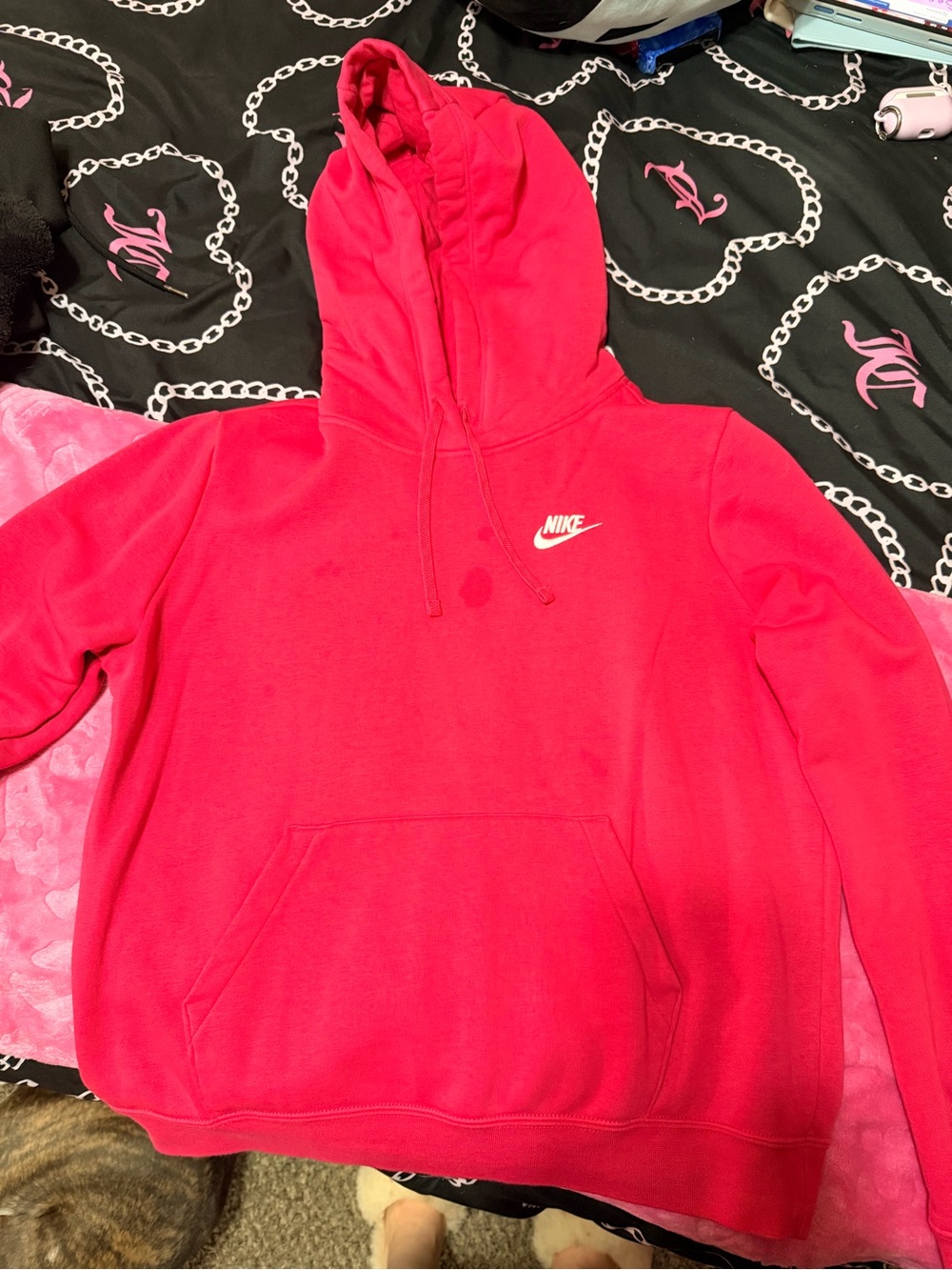 Pink women’s size medium Nike hoodie.